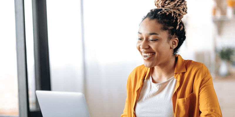 Woman on her laptop thinking about the future of work 